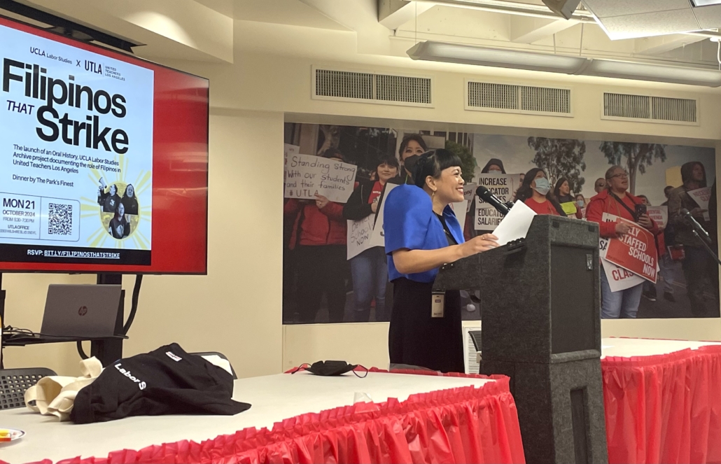 Jollene Levid speaks to crowd at podium at UTLA UCLA Labor Studies event