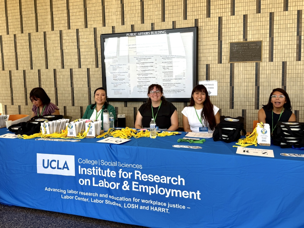 UCLA IRLE staff and volunteers welcome attendees of the 2025 UCLA Strategic Labor Research Conference