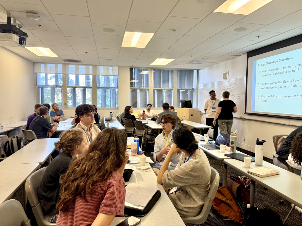 SLRC attendees engage in a collaborative discussion exercise in a workshop