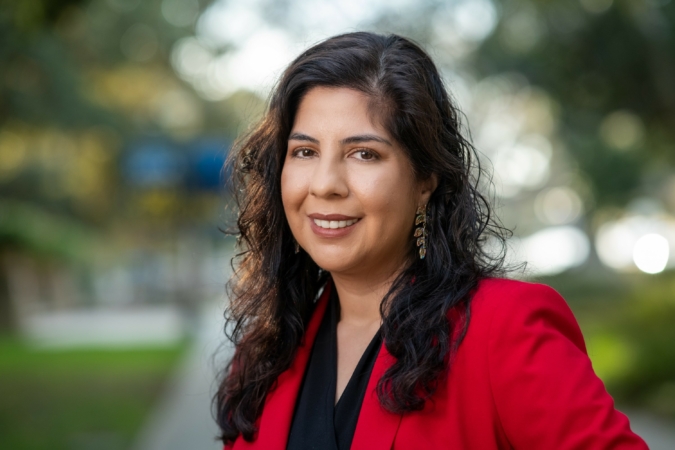 Ana Christina Ramón smiles in a headshot