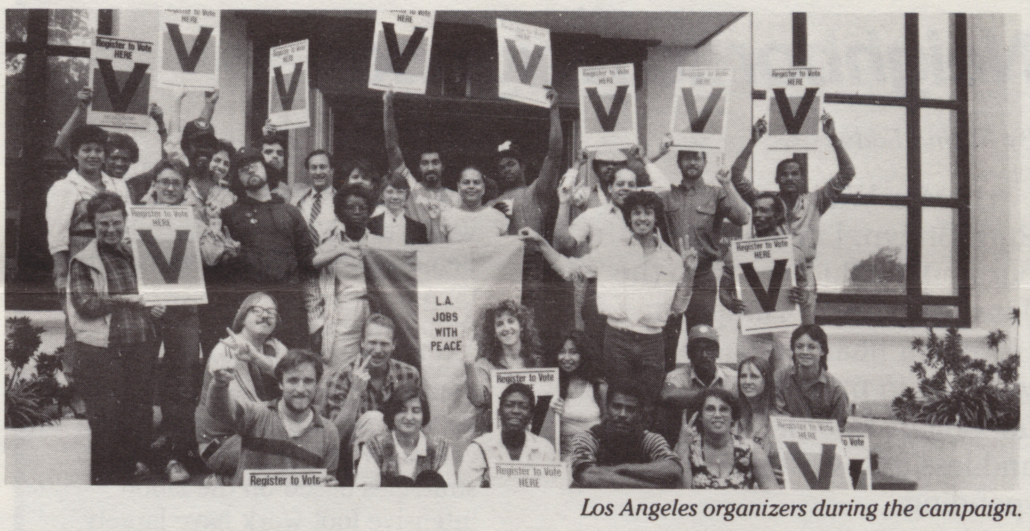 Activists with the 1986 Los Angeles Jobs with Peace campaign hold signs for Proposition V outside the International Ladies Garment Workers union hall on MacArthur Park. Larry Frank Collection, Southern California Library.