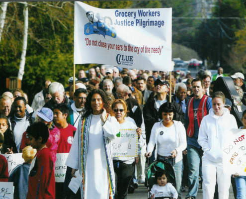 Clergy and Laity United for Economic Justice (CLUE) leads a Grocery Workers Justice Pilgrimage during the Southern California supermarket strike of 2003-2004. At the front of the march is Rev. Alexia Salvatierra. LAANE Collection, IRLE Archives.