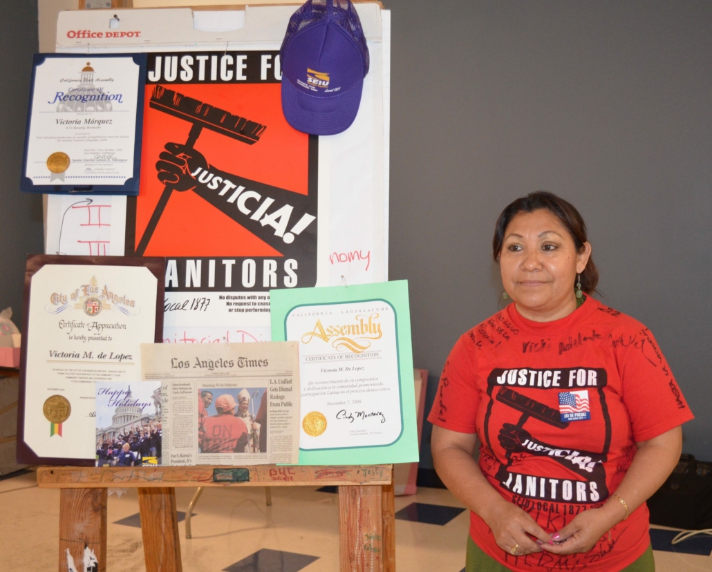 Rank and file activist Victoria Marquez shares her personal collection of newspapers, documents, t-shirts, hats, and buttons at a Justice for Janitors Day event in 2011. IRLE Archives.