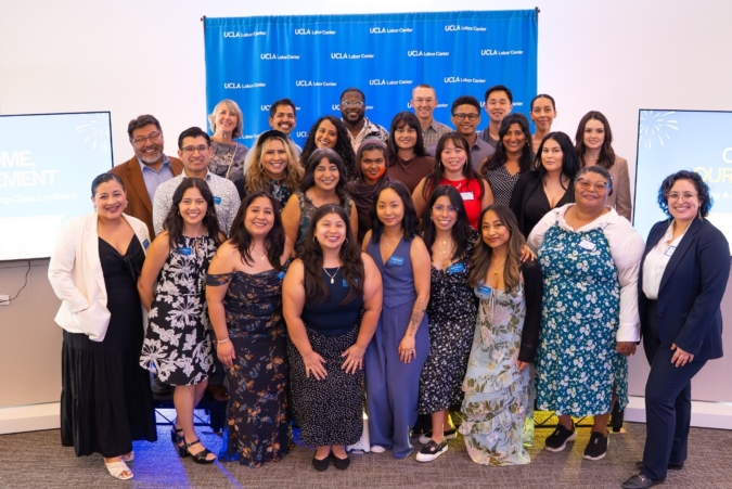 UCLA Labor Center staff poses and smiles for a group photo at the James Lawson Jr. Worker Justice Center Homecoming Celebration
