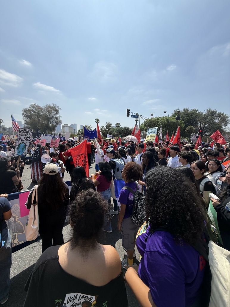 Point of view image from the UCLA Labor Studies contingent marching through Downtown Los Angeles / UCLA Labor Studies