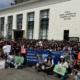 Students, faculty and staff participating in the UCLA Labor Studies 2026 May Day contingent pose for a group photo outside of the UCLA James Lawson Jr. Worker Justice Center in MacArthur Park / UCLA Labor Studies