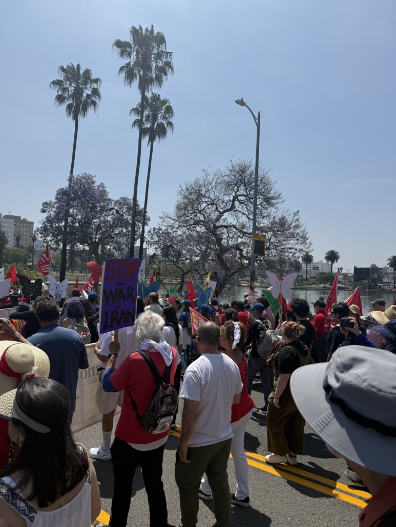 Point of view image from the UCLA Labor Studies contingent marching through Downtown Los Angeles / UCLA Labor Studies