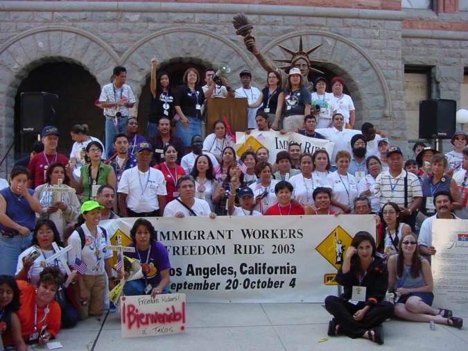 Freedom Riders from Los Angeles pose for a photo en route to Washington D.C. during the Immigrant Workers Freedom Ride in 2003 / LAANE Photo Collection, IRLE Archives
