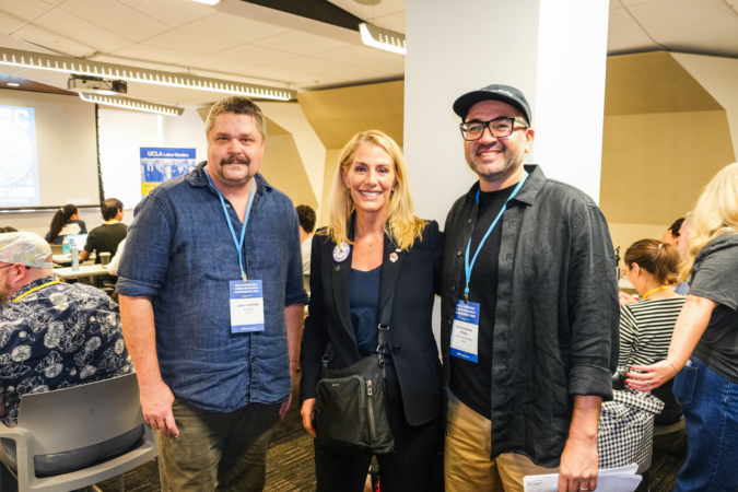 Conference organizers Justin McBride (L) and Chris Zepeda-Millán (R) post with keynote speaker Sara Nelson (center) / UCLA IRLE